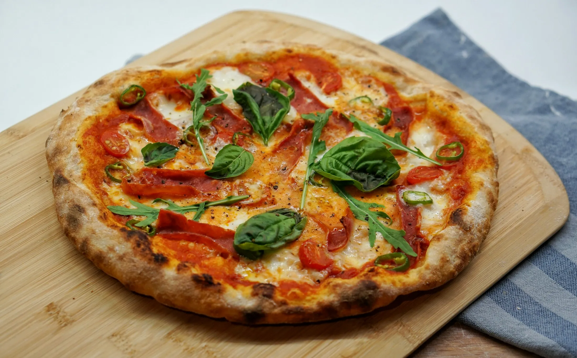 Crudo e rucola